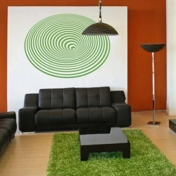 Abstract painting template 1068 - Living room arrangement with orange walls, dark furniture, and light flooring.