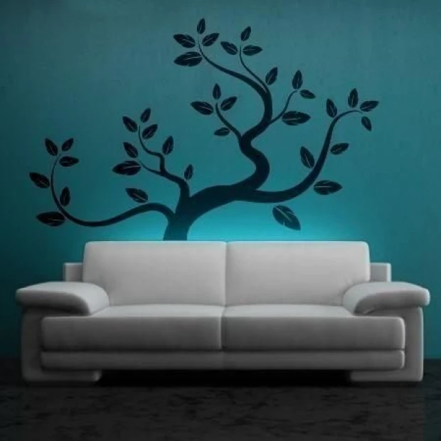 Elegant minimalist wall tree in a modern living room, adding charm and depth.