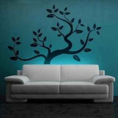 Elegant minimalist wall tree in a modern living room, adding charm and depth.