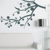 Elegant flower branch in muted colors, perfect for a modern living room.