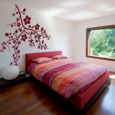 Painting template branch 1030 - Bedroom arrangement with light walls, red headboard, and colorful bedding.