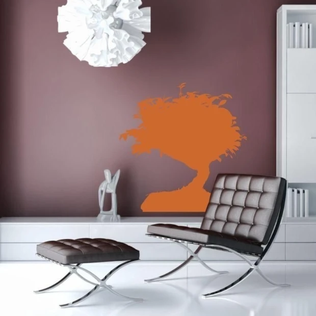 Elegant bonsai tree in vibrant orange, perfect for a modern living room.