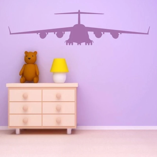 Pastel purple airplane sticker, perfect for a child\'s room, adding a cheerful touch.