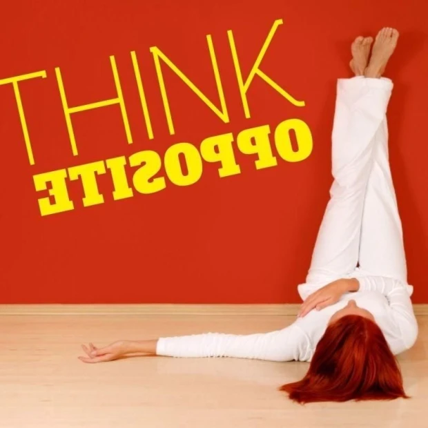 Painting template 02X 18 think opposite 1724 - Living room setup. Red wall with a person lying on the floor.