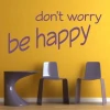 Painting template 02X 18 don\'t worry be happy 1735 - Modern interior design with a yellow wall and furniture in shades.