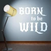 Sticker 03X 03 born to be wild 1707 - Room setup with a blue wall and a floor lamp.
