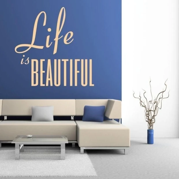 Sticker 03X 16 life is beautiful 1746 - Living room setup with blue wall, light sofa, and table.