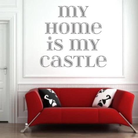 Sticker 03X 18 my home is my castle 1725 - Living room decor. Light-colored walls, red sofa with black accents.
