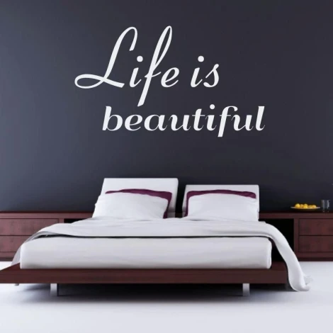 Sticker 03X 21 life is beautiful 1742 - Bedroom setup with dark walls and a bed featuring white bedding.