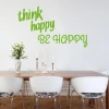 Sticker 03X 21 think happy be happy 1744 - Dining room setup with light walls, wooden table, and white chairs.