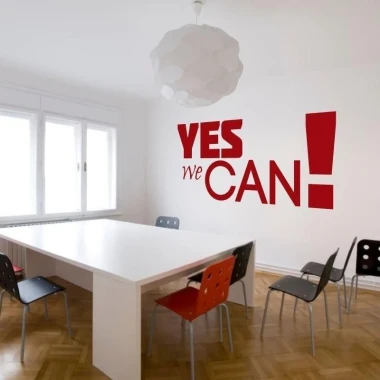 Sticker 03X 24 yes we can 1722 - Dining room setup with light walls and minimalist furniture.