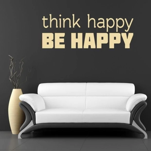 Sticker 03X 25 think happy be happy 1738 - Living room setup with dark wall and light sofa.