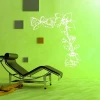 Floral sticker 03X 08 - Room decor with a green wall and white graphic elements.