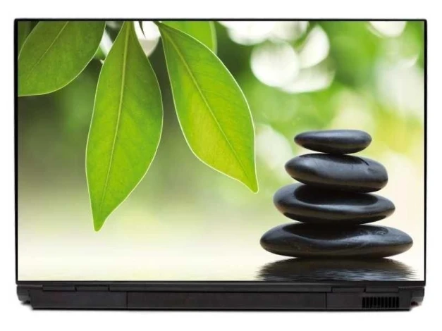 Zen garden laptop sticker 0052 - Graphic design with green leaves and stacked stones on a blurred green background.