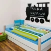 Chalk sticker 053 city - Decor in a children\'s room. Light-colored walls and a bed with blue bedding.