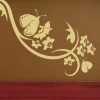 Floral painting stencil with butterflies, perfect for brightening up rustic interiors in warm tones.