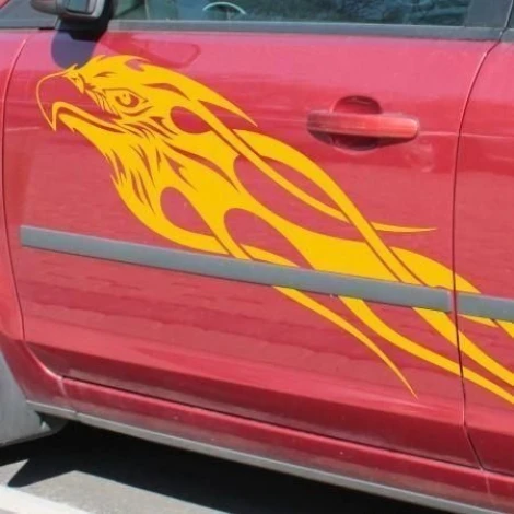 Eagle in a dynamic pose on a red background, perfect for car or sporty interior decoration.