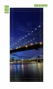 Brooklyn 84 door mural - Graphic design of a lit bridge at night with water reflecting lights.