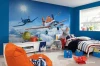 Disney Planes Wallpaper 8-465 - Decor in a child\'s room. Light-colored walls and simple style furniture.