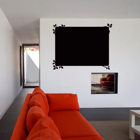 Chalk sticker 004 butterfly leaves - Modern living room decor with light walls and an orange sofa.