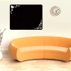 Chalk sticker 009 butterfly flowers - Room decor with light walls and an orange sofa.