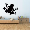 Charming chalkboard frog sticker for a child\'s room, adding a cheerful touch to a light wall.