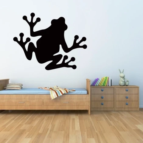 Charming chalkboard frog sticker for a child\'s room, adding a cheerful touch to a light wall.