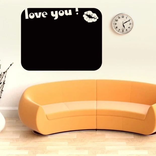 Chalk sticker 039 lips - Styled in a living room with a light-colored wall and an orange sofa.