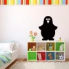 Chalk sticker 041 penguin - Decor for a child\'s room. Light-colored walls and a carpeted floor.