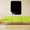 Chalk sticker 062 cat - Living room setup with light-colored walls and green furniture.