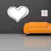 Dry-erase board 031 heart - Living room setup with dark wall, orange sofa, and wall clock.