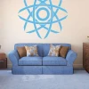Sticker 03X 16 abstract 1836 - Living room setup with light walls, blue sofa, and plaid cushions.