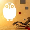 Dry-erase board 007 owl - Styled in a modern interior with warm-toned walls and a lounge nearby.