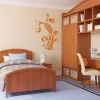 Sticker 03X 15 plant ornament 1872 - Bedroom decor with light walls and warm wooden furniture.