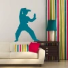 Sticker 03X 08 karate 1860 - Living room setup with light-colored walls and dark furniture.