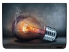 Laptop sticker bulb P143 - Graphic design featuring a light bulb with visible internal elements and smoke.