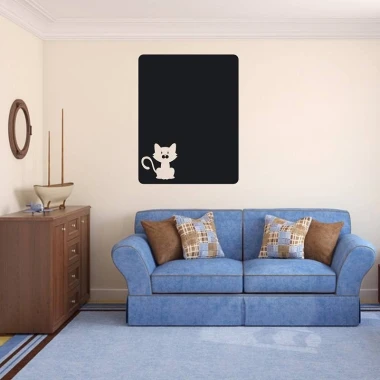 Chalkboard cat sticker 109 - Living room setup with light walls and a blue couch with checkered pillows.