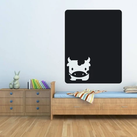 Chalkboard cow sticker 104 - Decor for a child\'s room with light-colored walls, wooden furniture, and flooring.