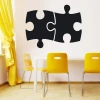 Chalkboard puzzle sticker 089 - Dining room setup with light walls and white and yellow furniture.