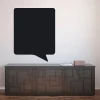 Chalk sticker speech bubble 123 - Room setup with light walls and dark geometric-patterned furniture.
