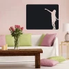 Chalk sticker woman 097 - Living room arrangement with light-colored walls and wooden furniture.