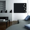 Chalk sticker with cat paw prints 120 - Styled in a modern living room with light walls and dark furniture.