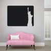 Chalk sticker of the Statue of Liberty 093 - Room decor. Light-colored wall, pink sofa.