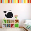 Chalkboard whale sticker 100 - Decor for a child\'s room. Walls in colorful stripes, furniture in light colors.