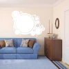 Abstract whiteboard 119 - Living room setup with light walls, blue sofa, and wooden dresser.