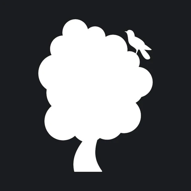 Dry-erase board in tree shape with cloud-like leaves and a bird on a branch.