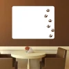 Dry-erase board with cat prints 120 - Dining room setup. Brown wall, table, and chairs in beige tones.