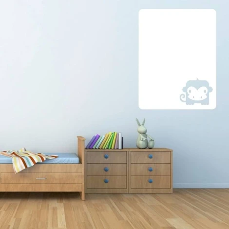 Monkey dry-erase board 105 - Decor in a children\'s room with light walls, wooden furniture, and colorful accents.