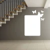 Dry-erase board butterflies 094 - Styled in a modern interior with gray walls. Visible wooden stairs.