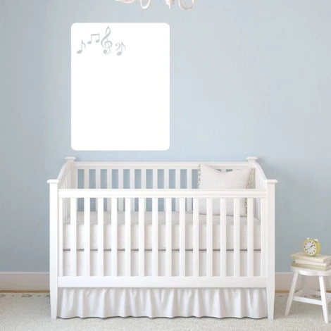 Whiteboard with musical notes 115 - Decor in a child\'s room with light walls, white furniture, and a crib.